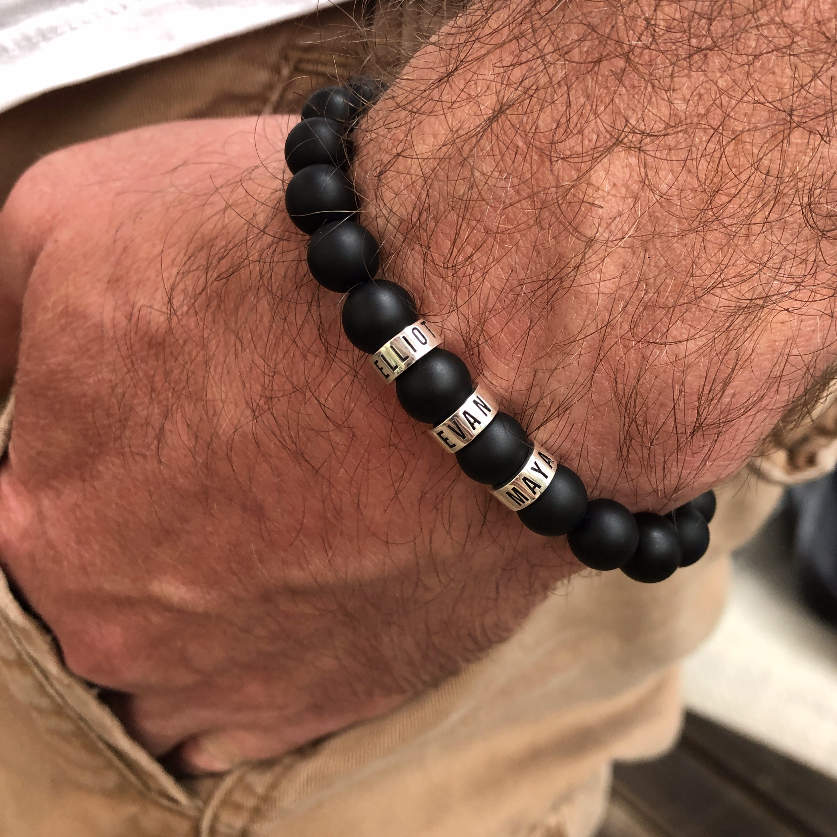 Beads bracelet with name engravings of your children. Black onyx gems