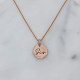 Médaillon initiale et diamants